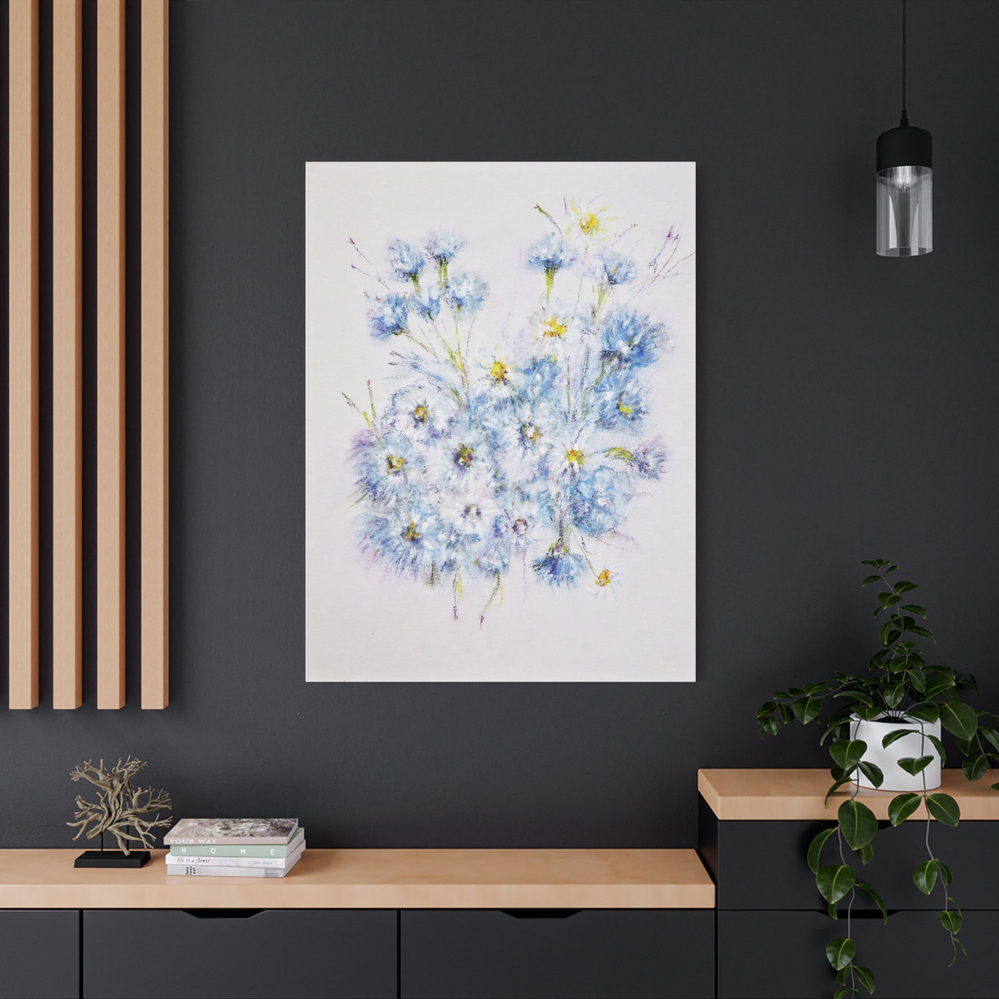 Canvas printed after original artwork on a dark wall with wooden shelves and decor plants.