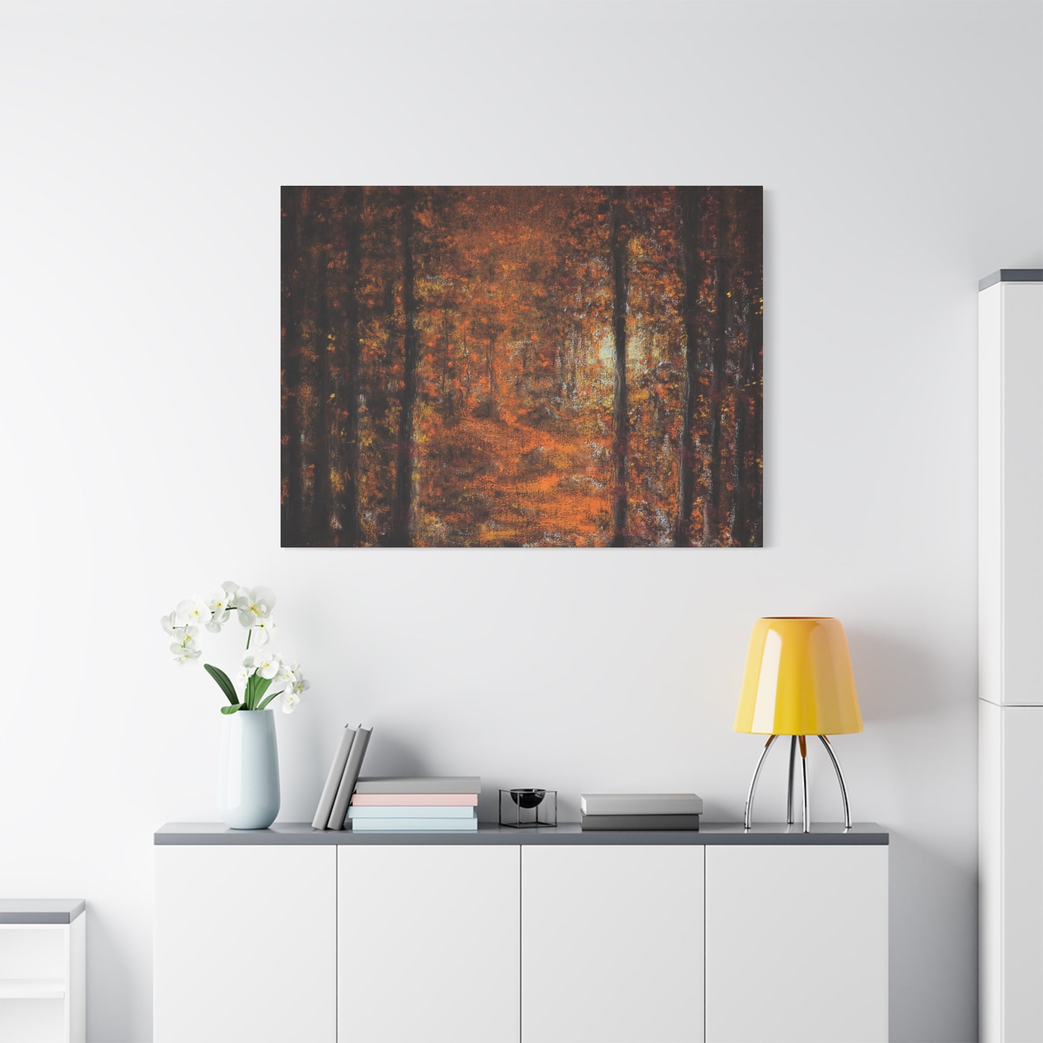 Autumn Forest Path Canvas Art-Abstract painting on a white wall above a white cabinet with decorative items.